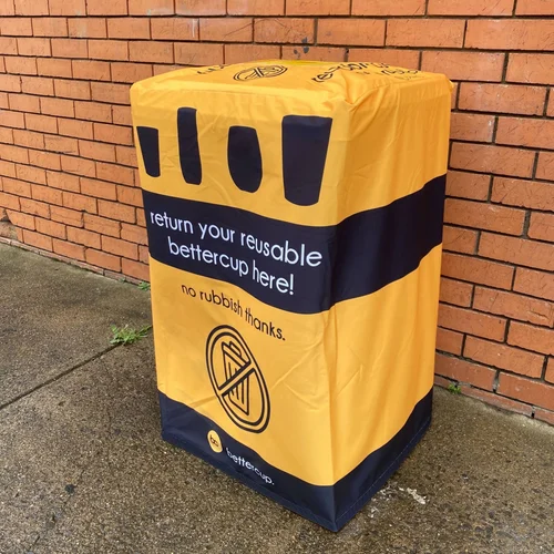 Reusable cup return bin with fabric cover for events and venues