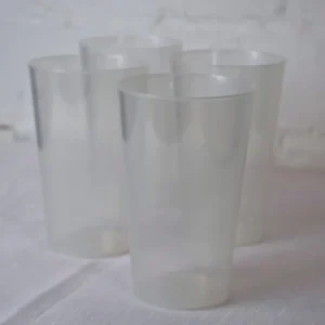 Stack of clear reusable bettercup tasters
