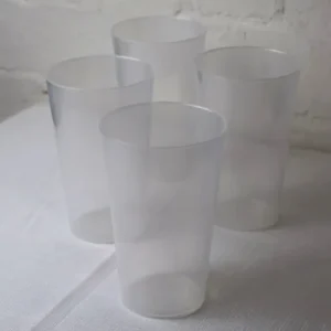 Stack of clear reusable bettercup tumblers