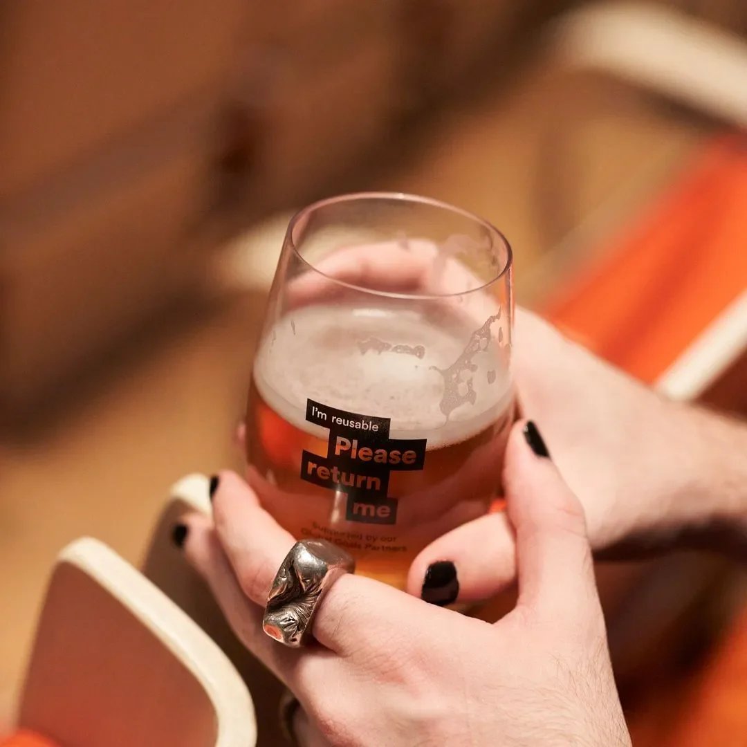 Close-up of custom stemless bettercup with drink at the Sydney Opera House event